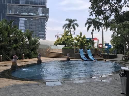 Cosmy Orchard Apartment Surabaia Exterior foto